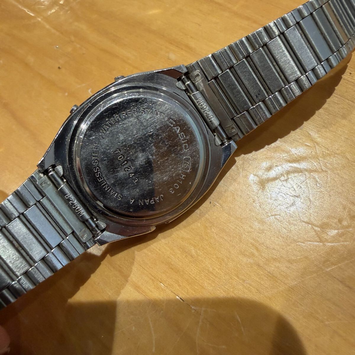 H103 底蓋刻印：方框 75、H103、JAPAN A、序號 701243